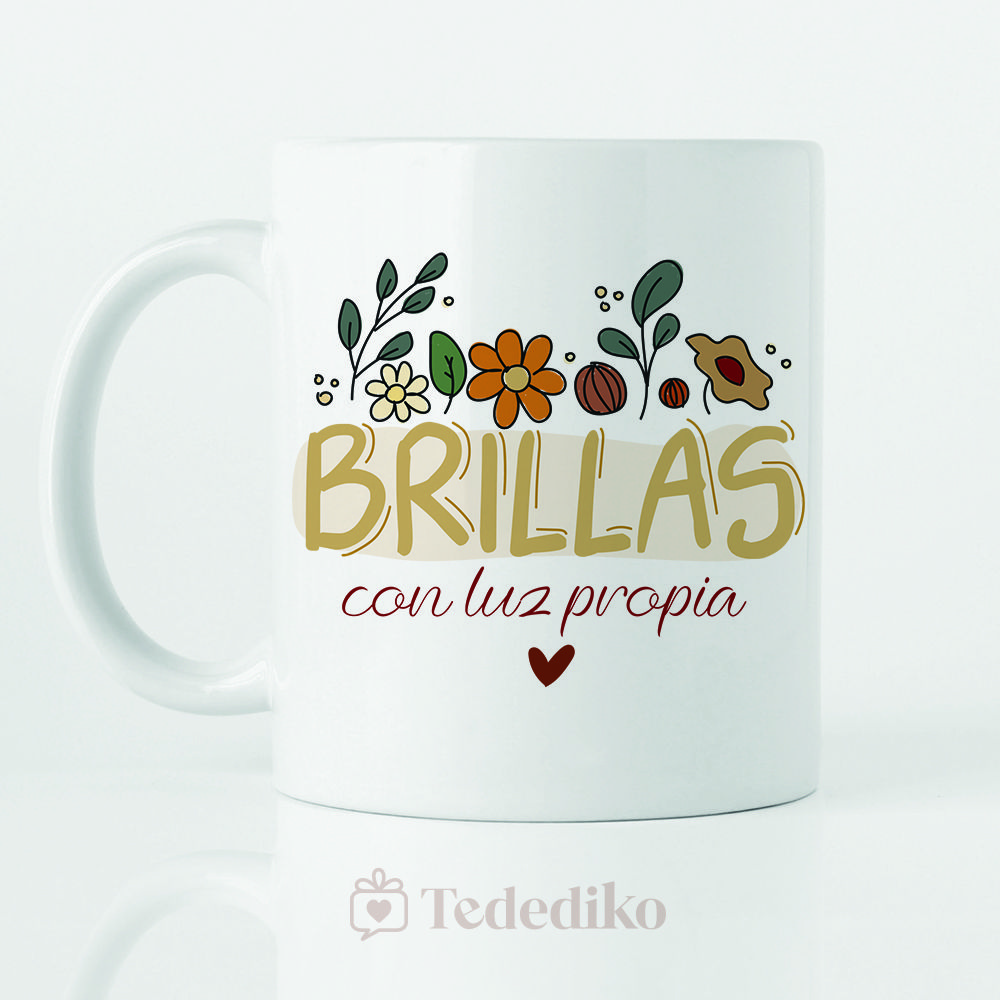 Taza de cerámica blanca con estampado a color "Brillas con luz própia" Diseño con flores.